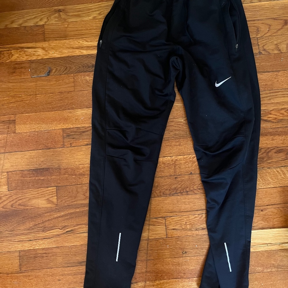 Men's Nike running pants, size M